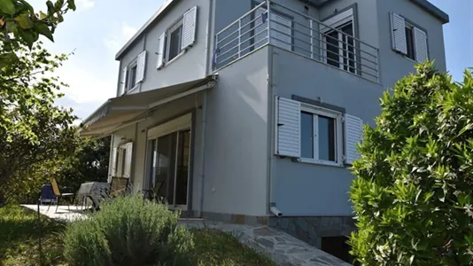 Houses in Aigialeia - photo 6